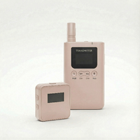 Pink HorsewhispererPRO Receiver and transmitters on a white background