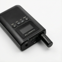 Black HorsewhispererPRO audio transmitter on a white background