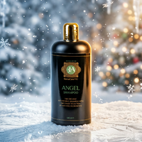 Angel Shampoo bottle with gold cap on a snowy background