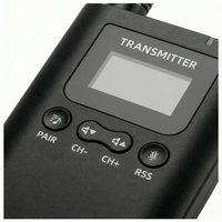 HorsewhispererPRO transmitter device with control buttons and display on a white background